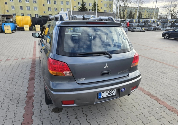 Mitsubishi Outlander cena 13000 przebieg: 150300, rok produkcji 2004 z Włocławek małe 301